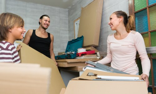 Moving truck and packed boxes for removals in Hornsey