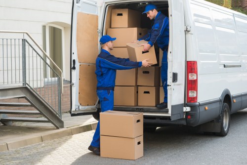 Careful loading of boxed household items for a Hornsey apartment relocation