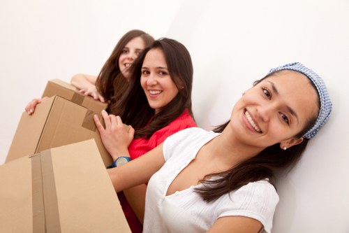 Small removals van handling furniture in Hornsey
